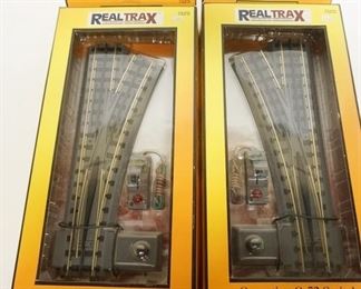 1128	RAIL KING 2 TRAINS O GAUGE SWITCHES IN BOX
