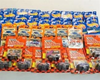 1309	LARGE LOT OF COLLECTABLE MODEL CARS INCLUDING MATCHBOX, HOTWHEELS & RACING COLLECTABLES NASCAR. NEW ON CARD
