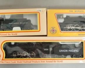 1311	LOT OF 3 HO MODEL TRAINS, TWO ARE IHC ONE IS MEHANO MASTER MODEL MAKERS, INCLUDES NORTHERN PACIFIC, UNION PACIFIC & SANTA FE.
