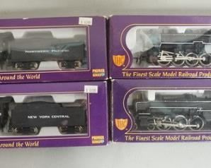 1310	LOT OF 4 IHC PREMIER SERIES MODEL TRAINS

