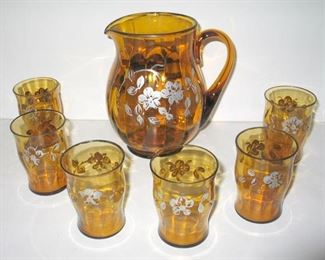 Amber glass set in silver overlay