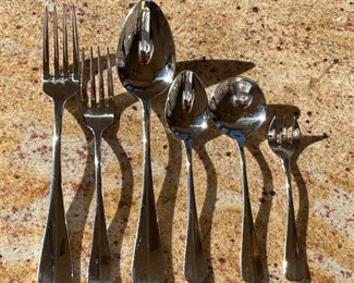 Stainless Steel flatware set	10 piece setting with extras	
