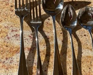 Stainless Steel flatware set	10 piece setting with extras	
