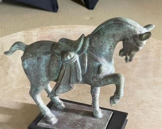 Sculpted metal horse 12 inches in length 3.75 inches wide 9.5 inches tall