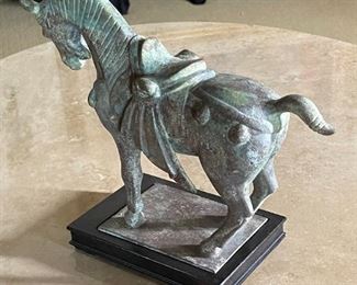 Sculpted metal horse	12 inches in length 3.75 inches wide 9.5 inches tall	
