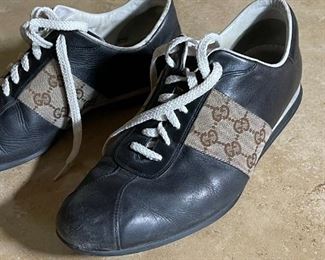 Gucci monogram lace up sneakers	Size 9	
