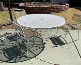 Wrought Iron Patio Table w/3 Chairs #1	26in H x 54in Diameter	
