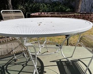 Wrought Iron Patio Table w/3 Chairs #1	26in H x 54in Diameter	
