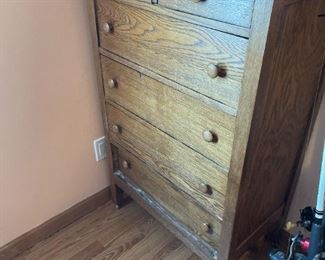 . . . an early 1900's oak chest of drawers