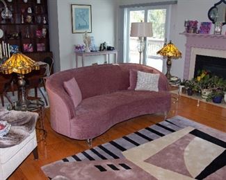 MC style sofa, Tiffany style table lamps, abstract carpet
