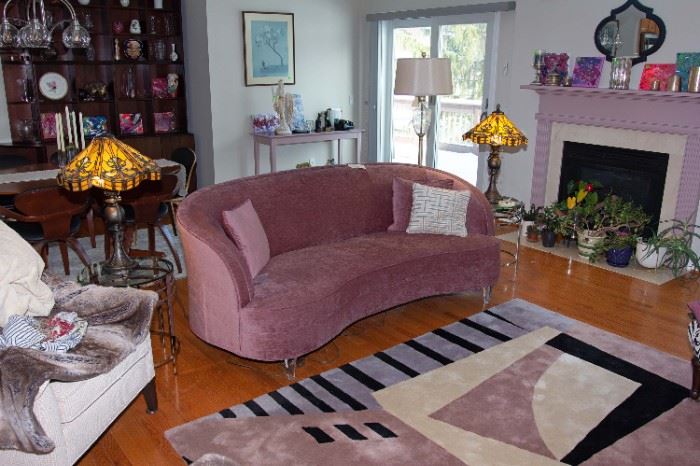 MC style sofa, Tiffany style table lamps, abstract carpet