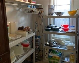 Assorted kitchen items, vacuum cleaner, ironing board, and more