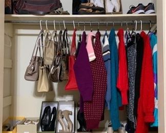A few clothes, shoes, and purses