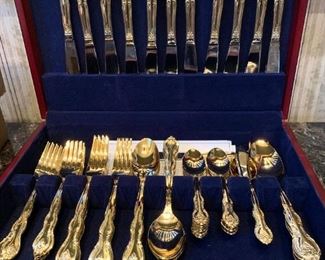 Goldtone flatware in box