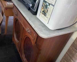 old marble topped cabinet
