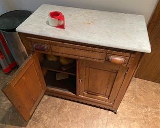 cool old cabinet with marble top $195