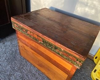 Wooden box, metal (tin?) lined with Asian writing on edge and characters on side $325