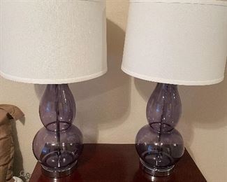 pair of purple glass lamps-signed on bottom 