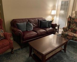 leather sofa-  and occasional chairs -coffee table  