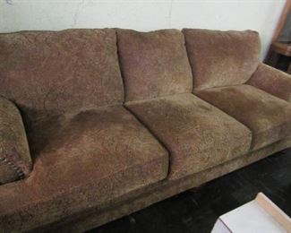brown sofa with burgandy design