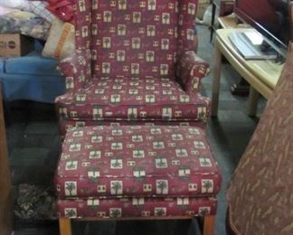 burgandy with palm tree pattern wing back chair and ottoman.