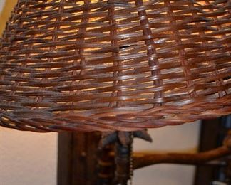 Two bedside lights with wicker shades