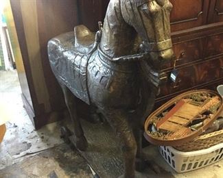 Hammered bronze over wood horse. Size Large.