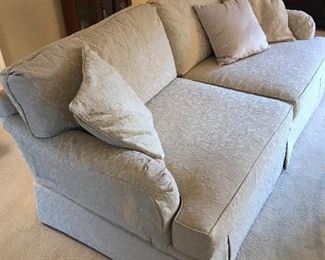 Cream upholstered double cushion sofa in great condition and comfortable!