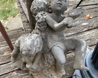 Small little boy concrete statue