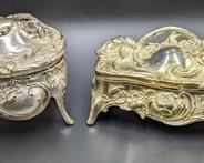 Pair of Vintage Jewelry/Trinket Boxes. There are some light scratches, but both look to be in otherwise good condition. The largest gold tone box measures 8” x 4” and 4” high.