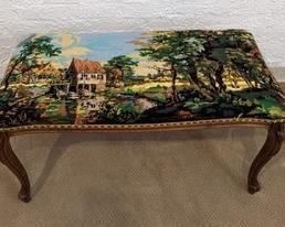 Lovely Scenic Designed Needlepoint Bench. There are some light scratches on the wood, but in overall great shape!

Measures 35” x 16” and 19” high.