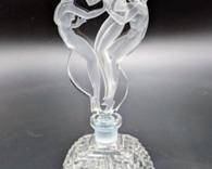 Vintage Czech Art Deco Perfume Bottle featuring three beautiful nude figurines. This exquisite piece measures 7.5” high and 3” wide at the base.