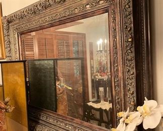 Large mounted ornate mirror