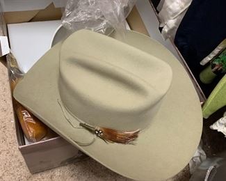 This is a Stetsons six and three eights hat felt worn once still has the original box and the caring box for it