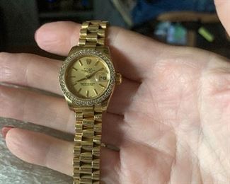 This is a woman’s Rolex diamond watch