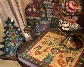 An assortment of hand painted tole selections