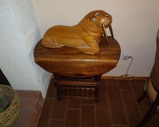 carved wood walrus with metal tusk