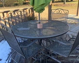 Outdoor table and four chairs with umbrella 