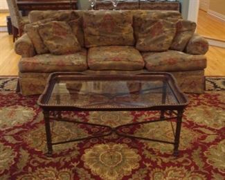 Living Room:  One of two matching HICKORY CHAIR sofas is shown.  This one measures 88" long and has six detached cushions an four toss pillows.  The glass top table has "leather" and nail-head trim with a metal frame.  A closer photo of the rug  follows.  