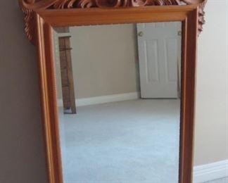 Bedroom #2-Upstairs:  This large shell top, beveled wall mirror measures 29" wide x 47" tall and would be a fine addition above a chest or bathroom sink.