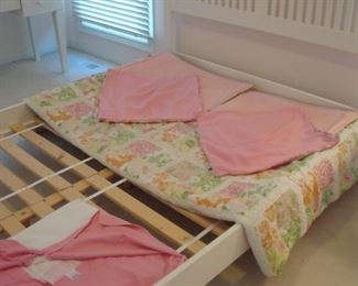 Bedroom #3-Upstairs:  The white queen-size CRATE & BARREL bed is now shown with a complete set of LILLY bedding: bed spread; two pale pink shams; two pink pillow covers; one pink bed skirt. 
