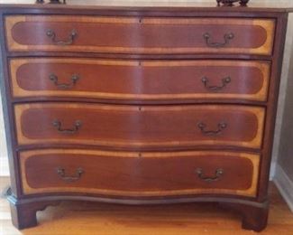 Foyer:  Now you can better see the banding and bracket feet on the handsome four-drawer chest.  It measures 48" wide x 20-1/2" deep x 39-l/4" tall. 
This piece would look great in any room!
