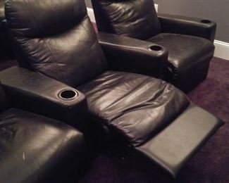 Lower Level-THEATER Room:  The center chair is now reclined. 