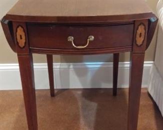 Lower Level:  This is one of a PAIR of classic Pembroke tables by HICKORY CHAIR from the "Historical James River Plantations" collection.   Each has fine banding, medallions, drop leaves, and a single drawer.  The next photo shows the leaves up.