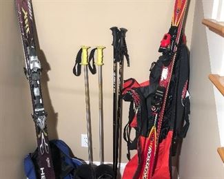 Lower Level:  Get ready for the snow! We have ROSSIGVOL Tail Ninety-four Glider (70 inch) skis with bag/case, HEAD-XRC LiquidMetal (62 inch) skis with bag/case, TECNICA ski boots (medium), and two sets of ski poles:   one set of SCOTT and one set of SMITH.