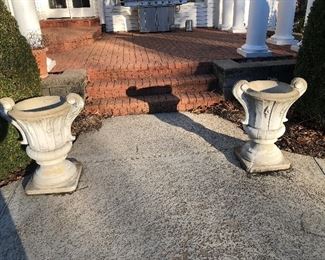 Back Yard-Patio:   A pair of two-piece concrete urns each measures 31" tall to the top of the scroll side handles. 