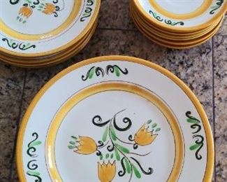 Kitchen Counter:  Vintage STANGL dishes in the "Tulip" pattern are priced out in groups:  salad plates; dessert plates; saucers.