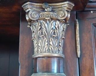 Living Room:  This is a closer photo of one of the two gold acanthus leaf capitals on one of the display cabinet columns.