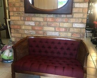 Let’s start with this settee with cane sides and above it a pine tavern mirror.