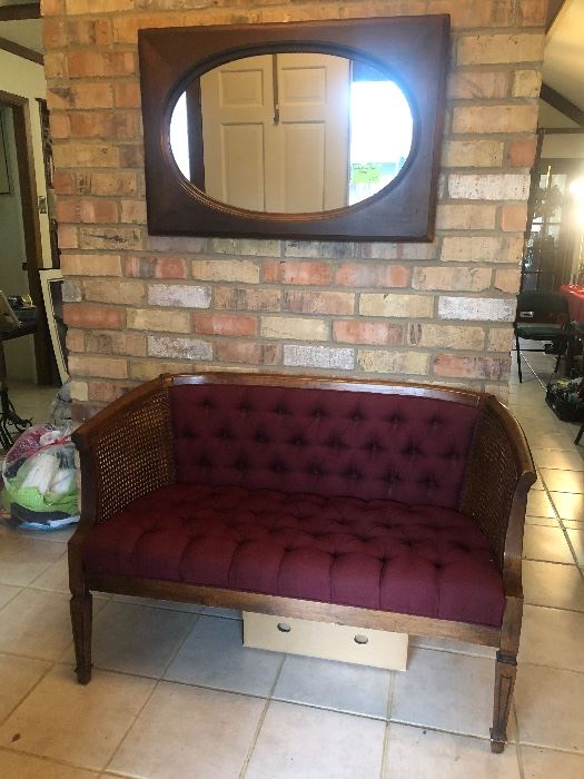 Let’s start with this settee with cane sides and above it a pine tavern mirror.